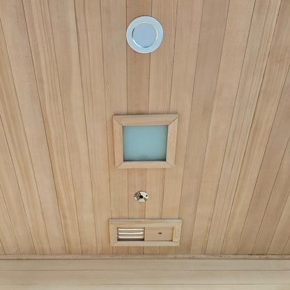 Wood-paneled ceiling with installed fixtures