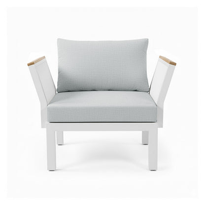 Sierra Outdoor Lounge Set in Grey features a modern single-seat armchair with a white frame, pale-gray cushions, and light wood accents on armrests, perfect for a resort-like outdoor experience.