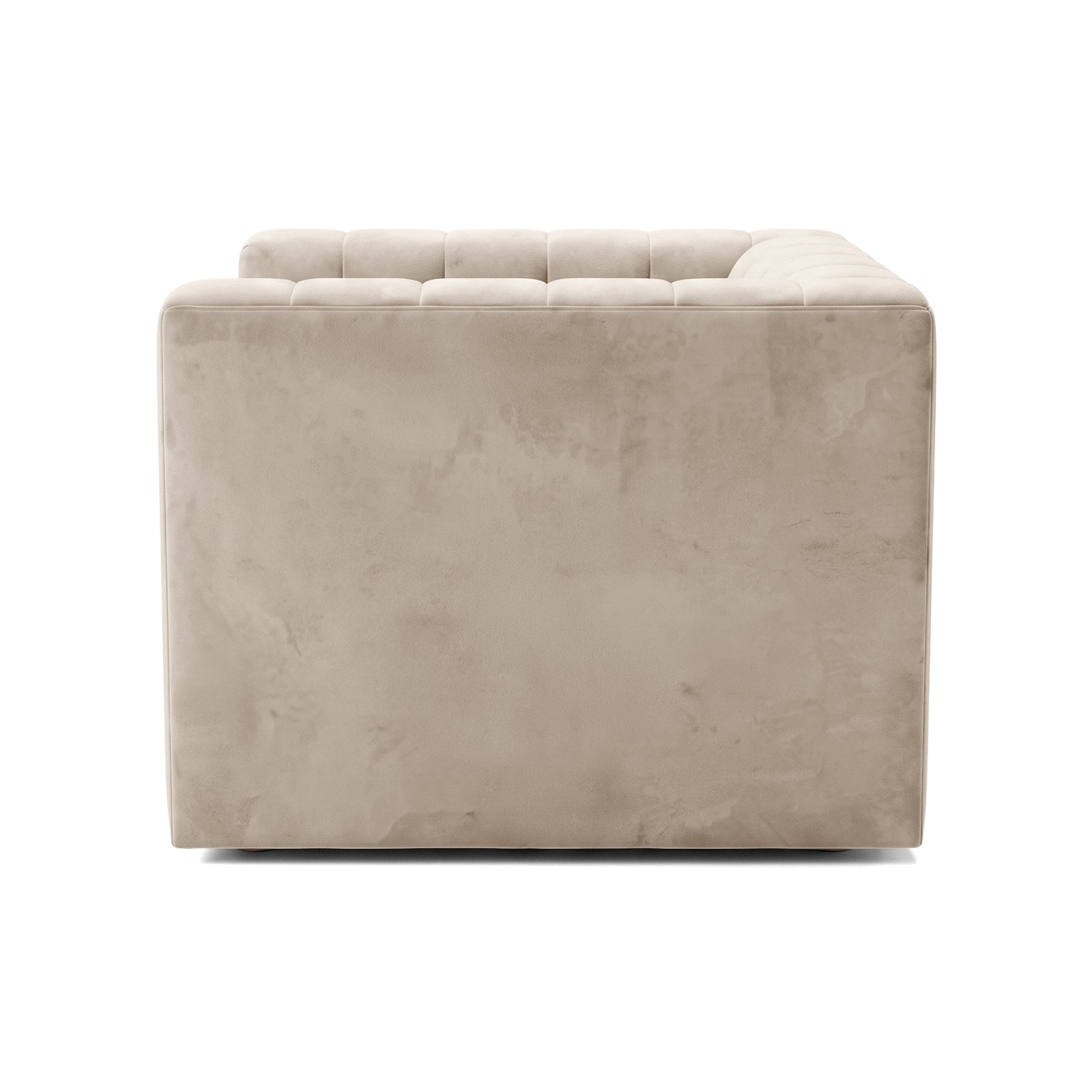 Partial side view of a beige sofa on a white background
