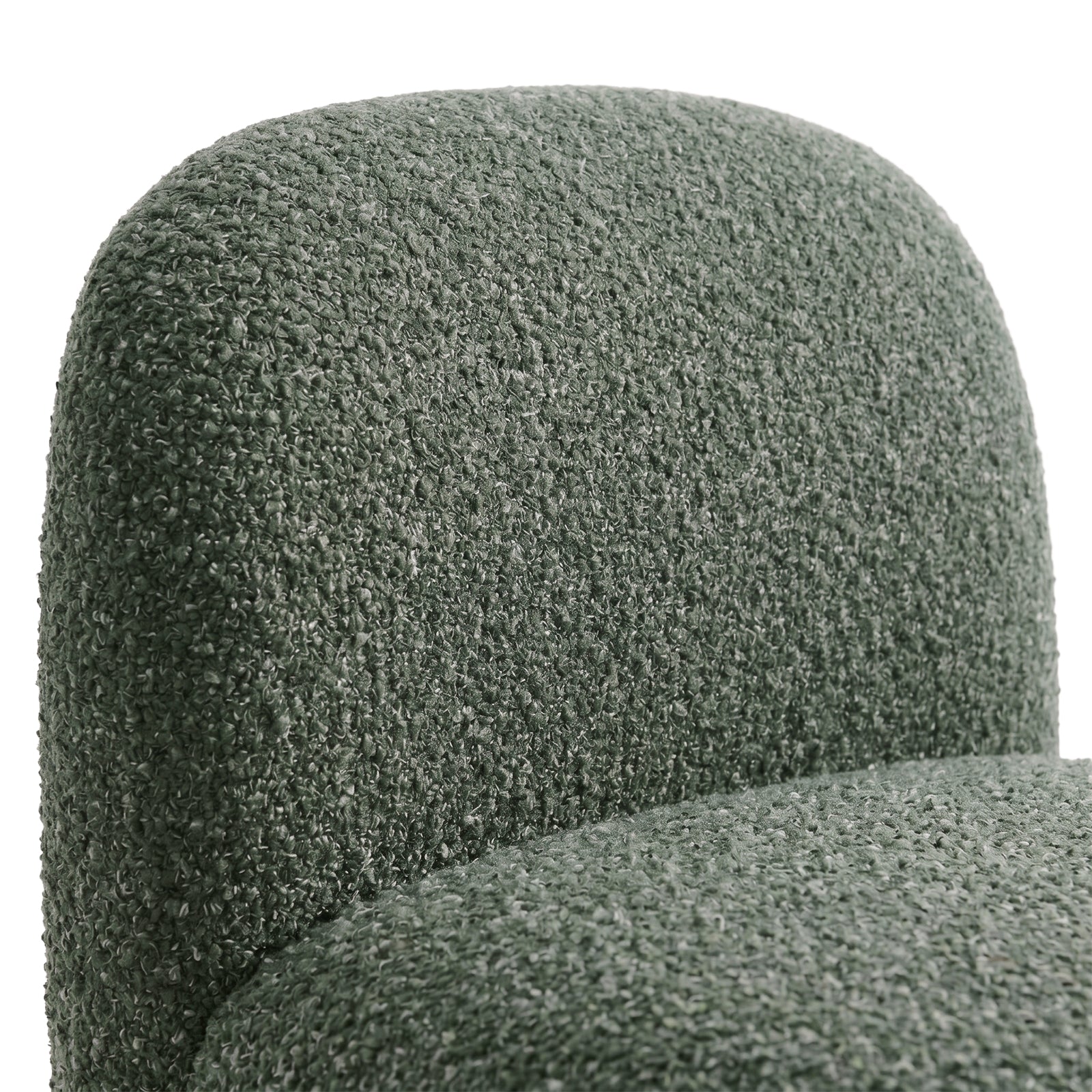 Close-up of green chair backrest and seat upholstery