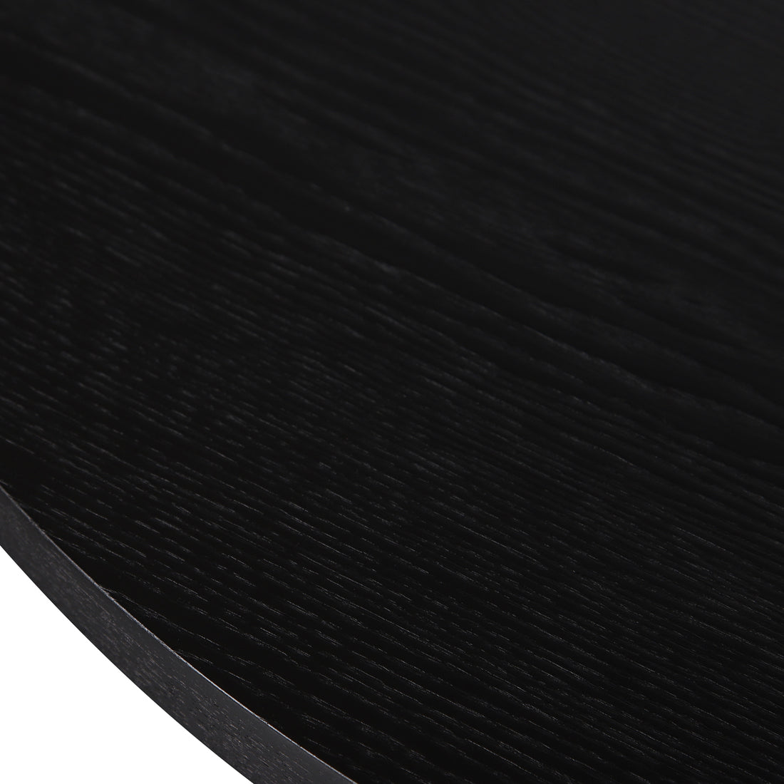 Close-up of the Gigi 180cm Oval Wooden Dining Table in Black, showcasing its dark wood-grain texture and smooth, refined edge, highlighting the elegant and durable design for modern dining spaces.