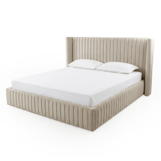 Beige upholstered king bed with mattress and pillows on white background