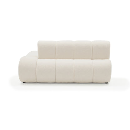Close-up of modular sofa section end view on white background