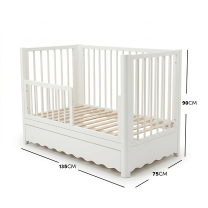 White baby crib with dimensions overlay on white background