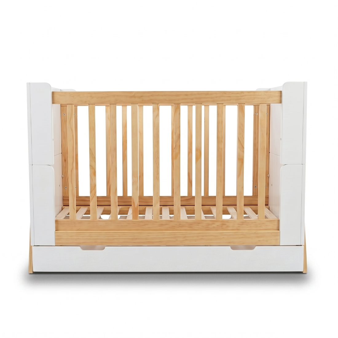 Front view of crib with wood slats and white side panels