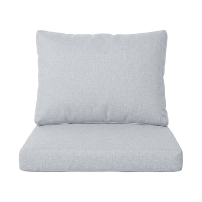 Two light gray chair cushions on white background