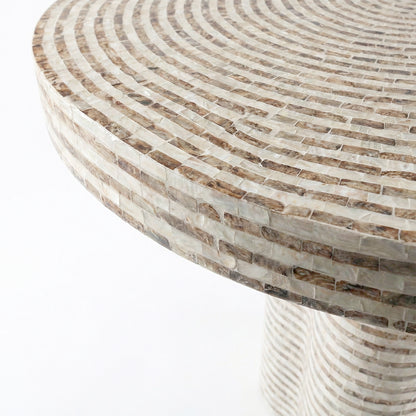 Close-up of mosaic table surface and edge on white background