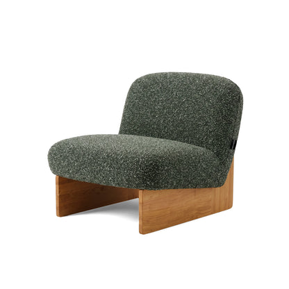 Green lounge chair side view on white background