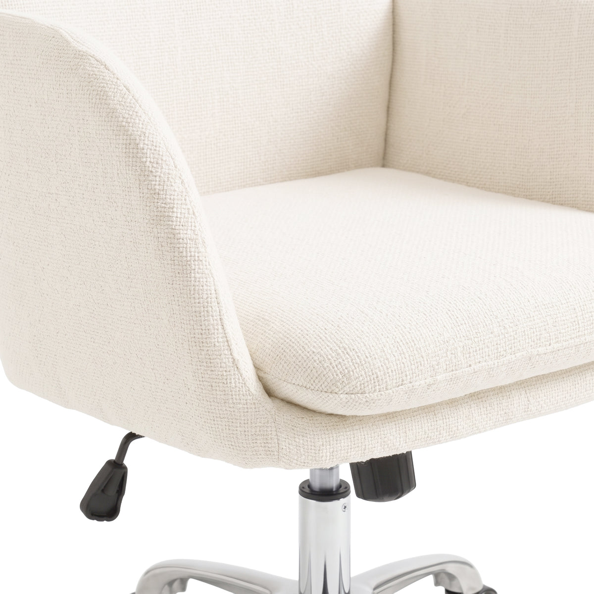 Close-up of the seat and base of a light beige upholstered chair on a white background