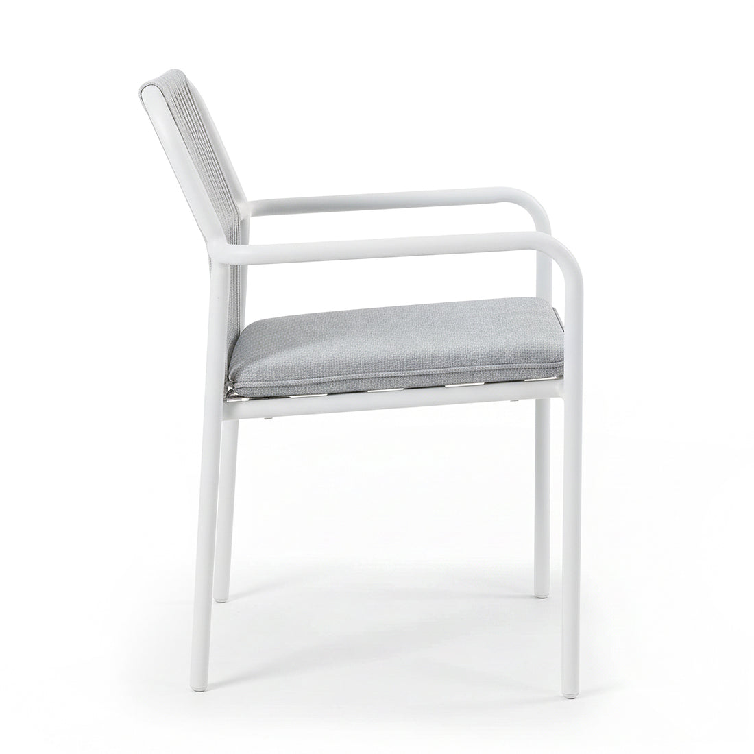 Evone 4 Seater Stone Outdoor Dining Table Set in Light Grey features a sleek stone tabletop and sturdy white metal frame, complemented by light gray upholstered chairs, perfect for stylish outdoor dining.