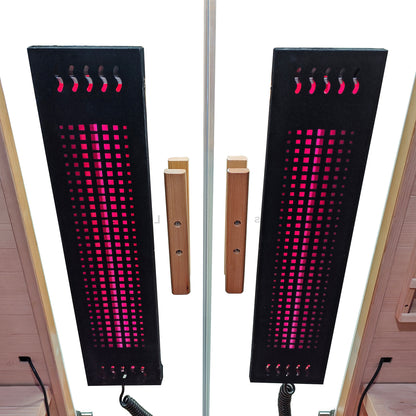 Two glowing infrared heating panels mounted inside a wooden sauna