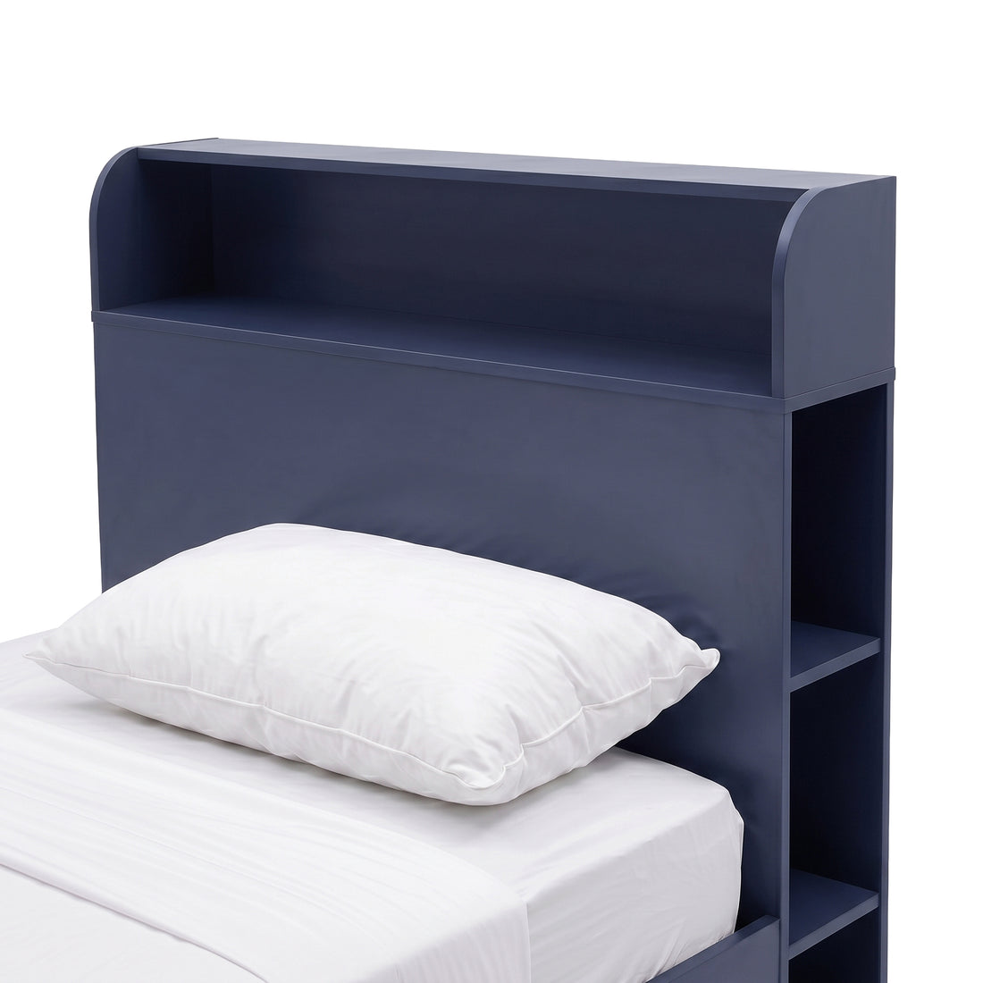 Partial view of a blue bed headboard with built-in shelving on a white background