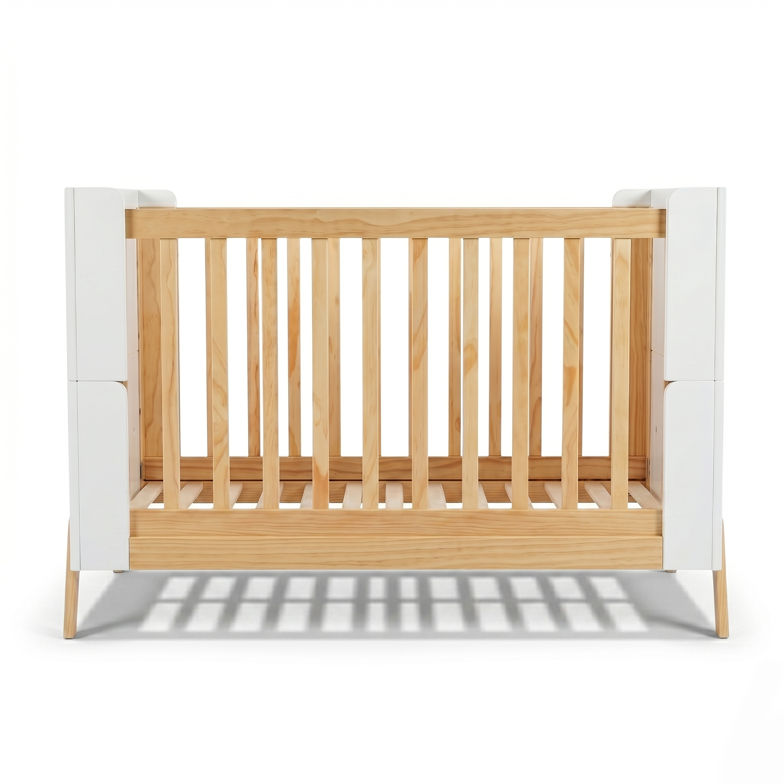 Modern wooden crib with white panels on white background