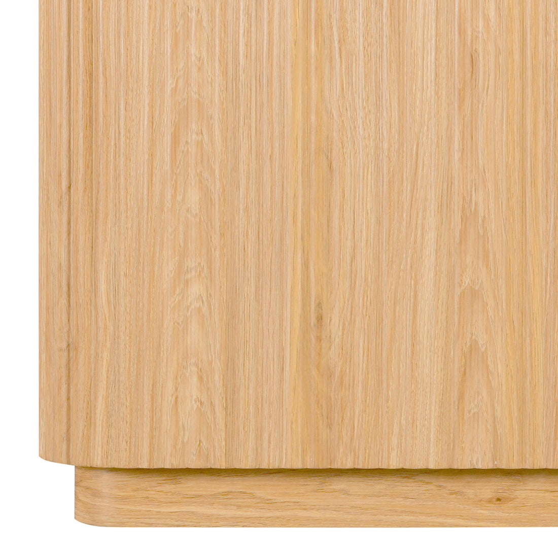 Close-up of the lower side and base of a wooden sideboard on white background