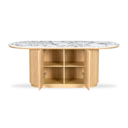 Oval marble-top table with light wood base and all cabinet doors open on a white background
