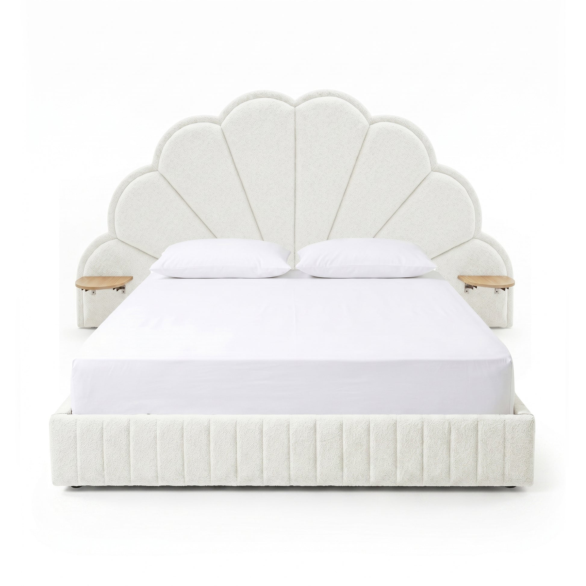 Full view of upholstered scallop headboard bed with built-in side tables on white background