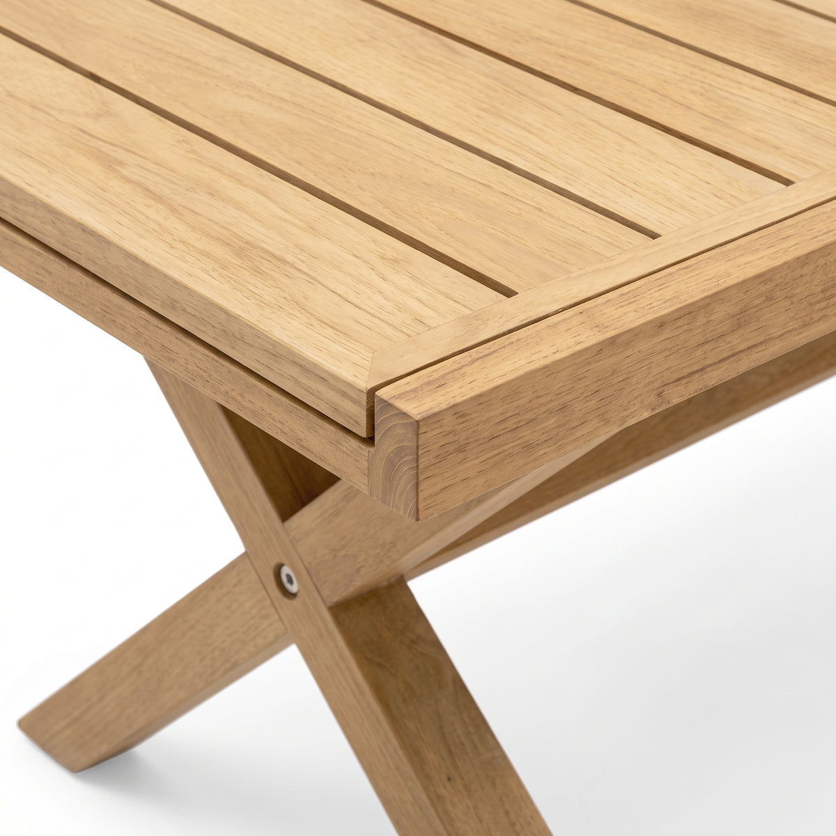 Close-up of wooden table corner and legs on white background