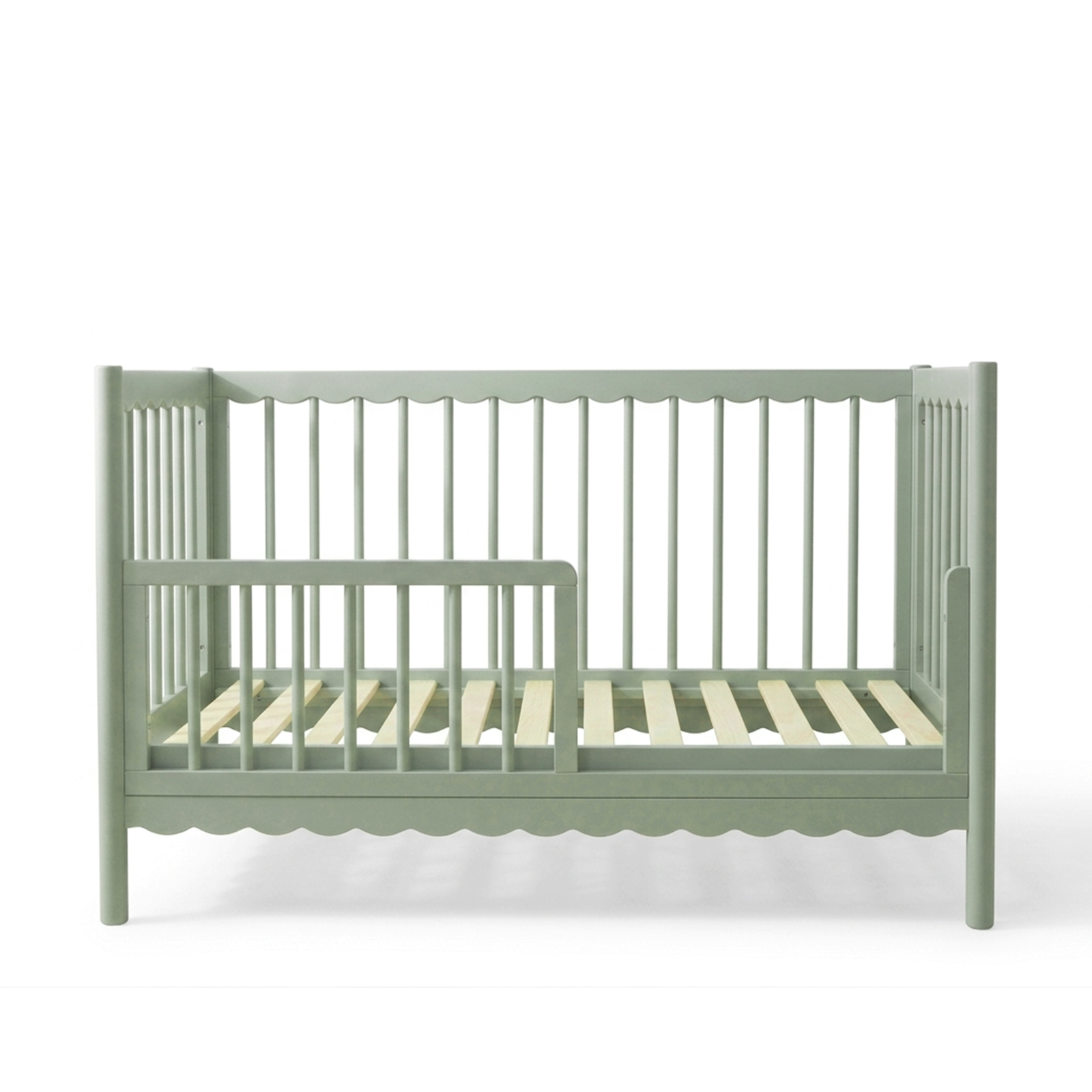 Sage green children's crib on white background