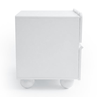 White boxy cabinet with handles and ball feet on white background