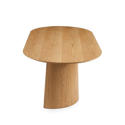 Wooden table with rounded rectangular top and cylindrical base on white background