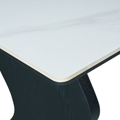 Close-up of table corner showing white marble-look top and dark base on white background