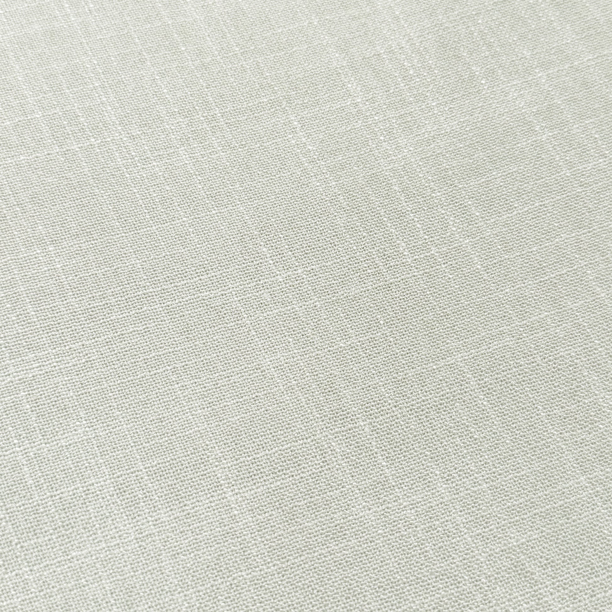 Close-up of light beige upholstery fabric texture