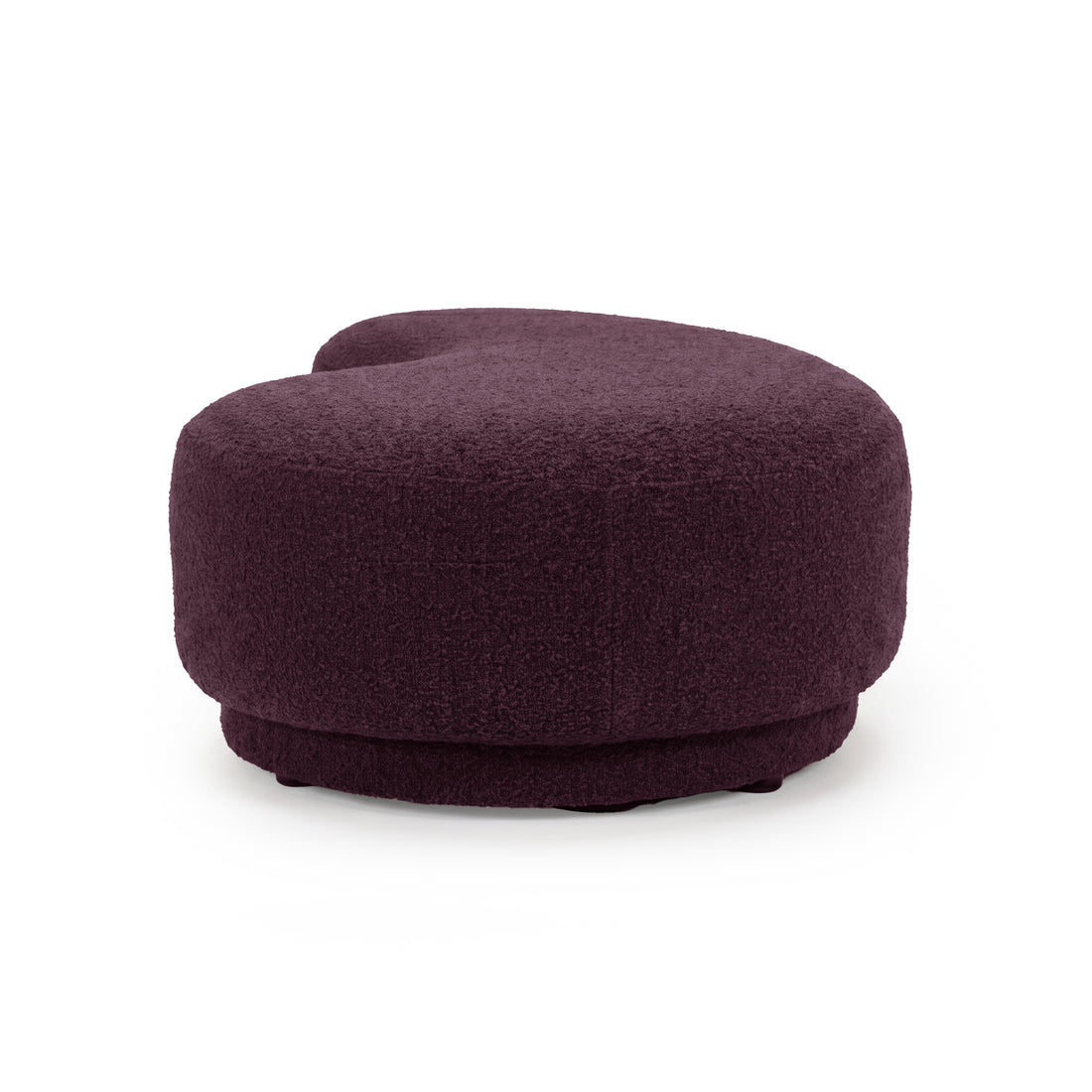 Plush modern bench seat with kidney-shaped design on a white background