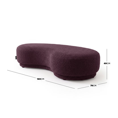 Plum kidney-bean shaped upholstered bench seat with dimension markers on a white background