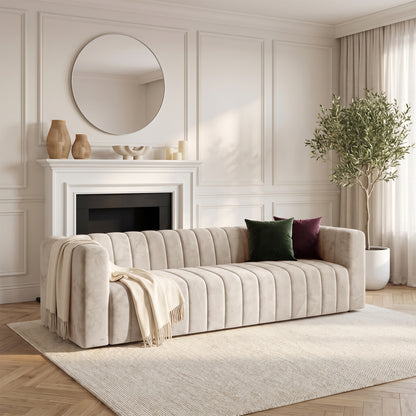 Beige sofa styled in an elegant living room