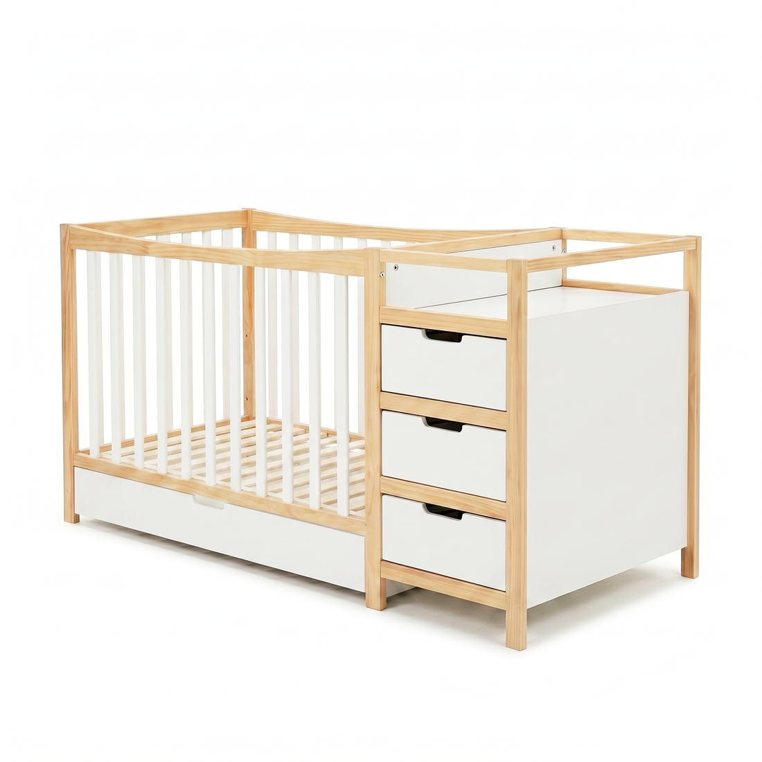 Modern baby crib with integrated changing table and drawers on a white background