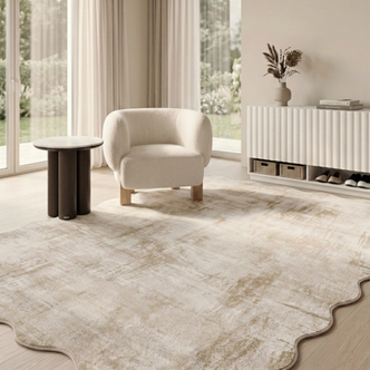 Scalloped-edge beige rug in a bright modern living room