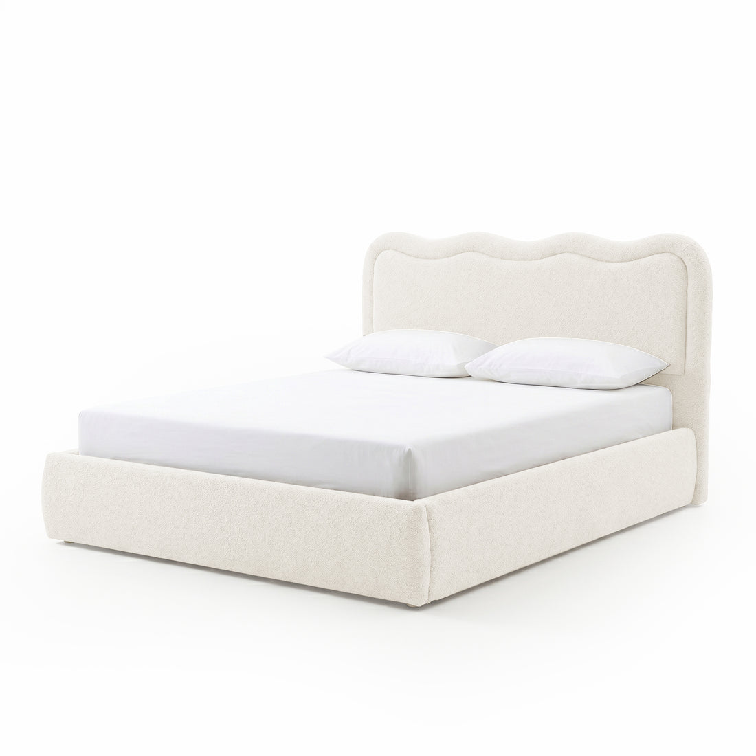 Modern upholstered bed with pillows on white background