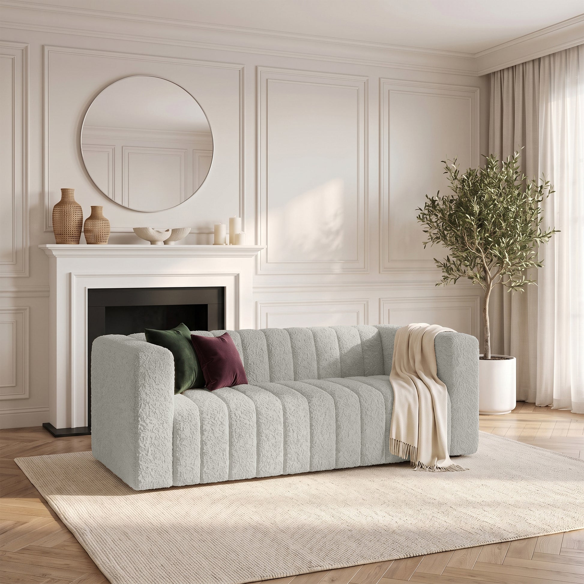Modern tufted sofa styled in a bright living room