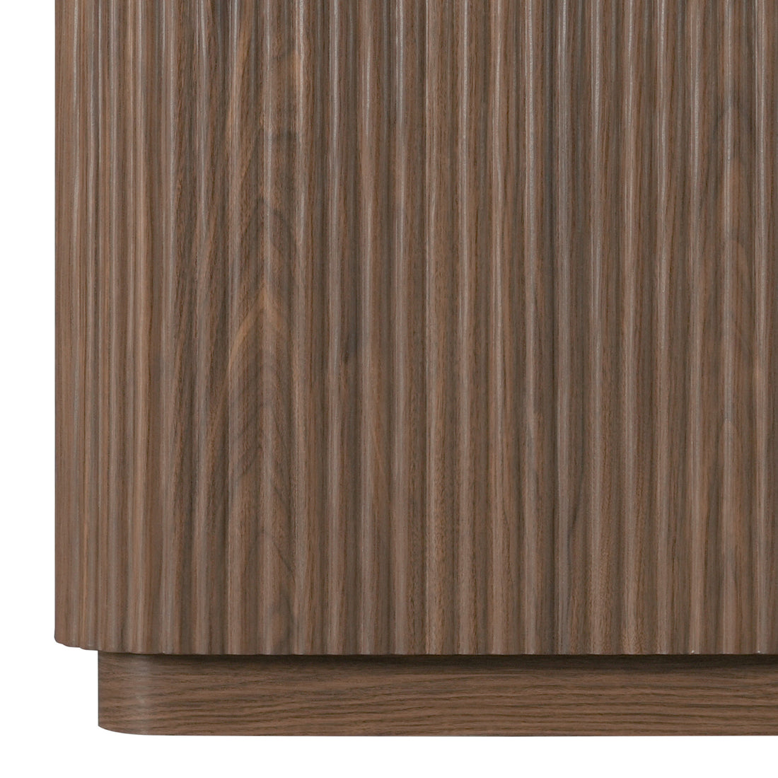 Close-up of ribbed wood texture on a furniture piece against white background