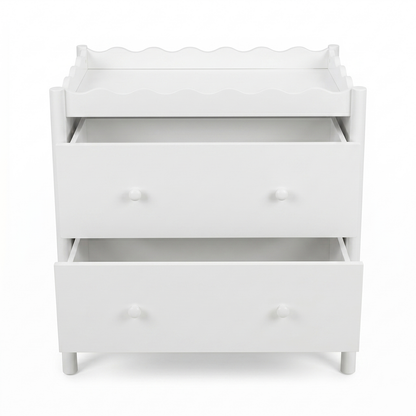 White changing table dresser with open drawers on a white background