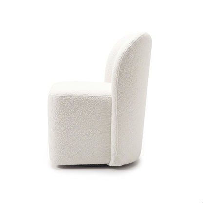 Side view of a plush white upholstered accent chair on a white background