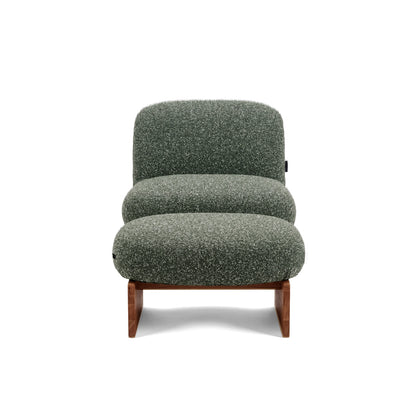 Front view of green lounge chair on white background