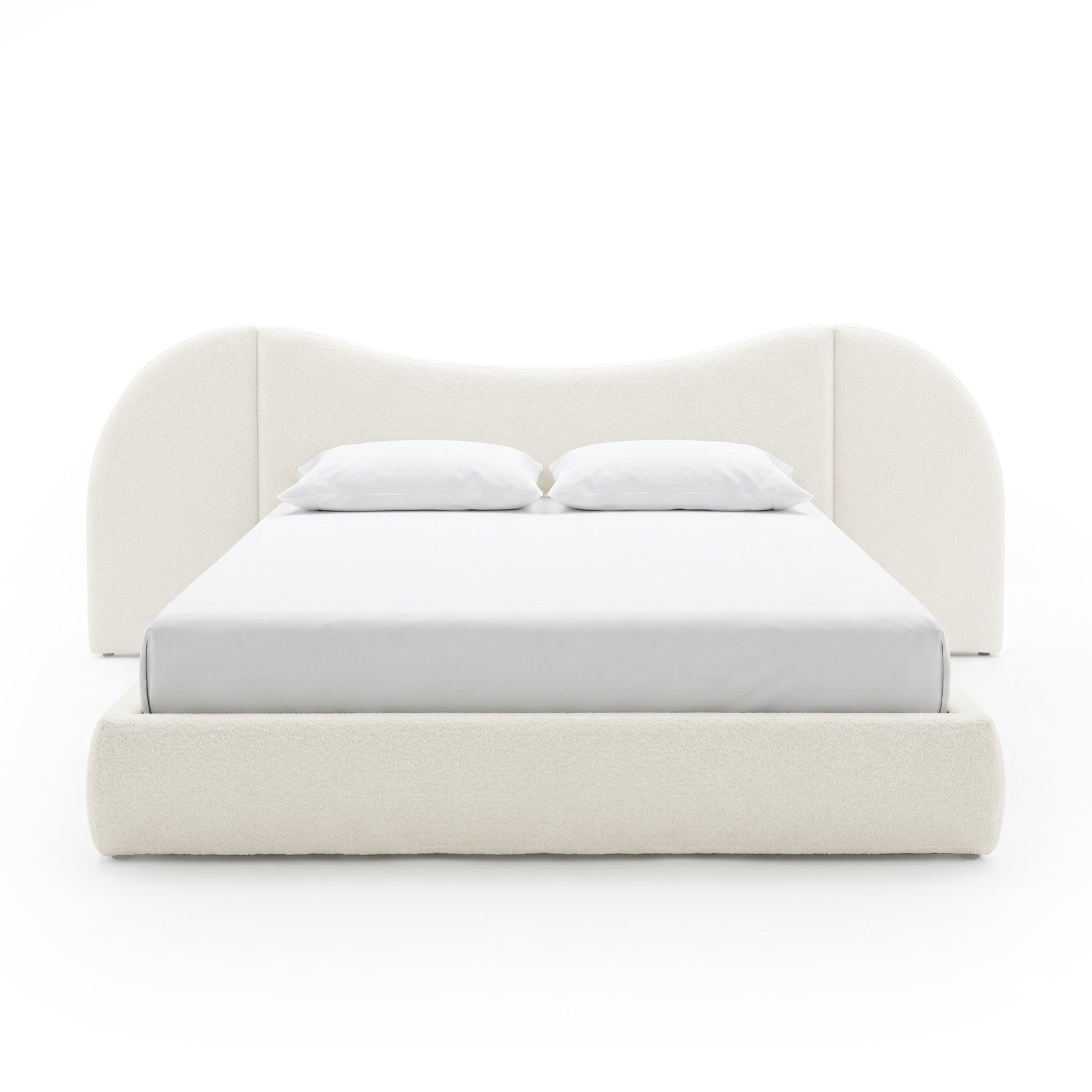Off-white upholstered bed with curved headboard on white background