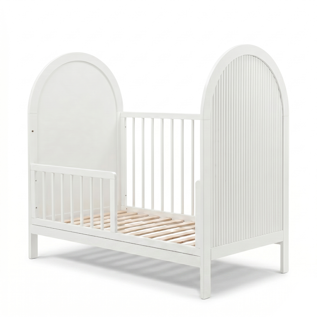 White wooden crib photographed on a white background