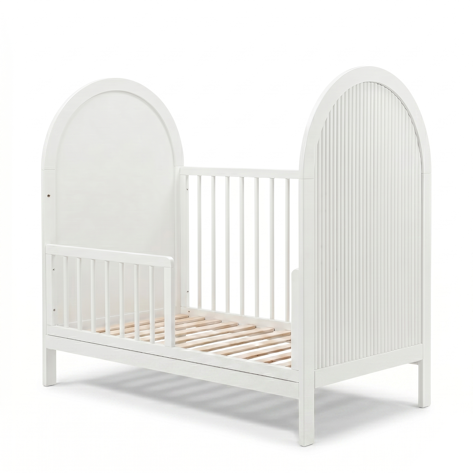 White wooden crib photographed on a white background