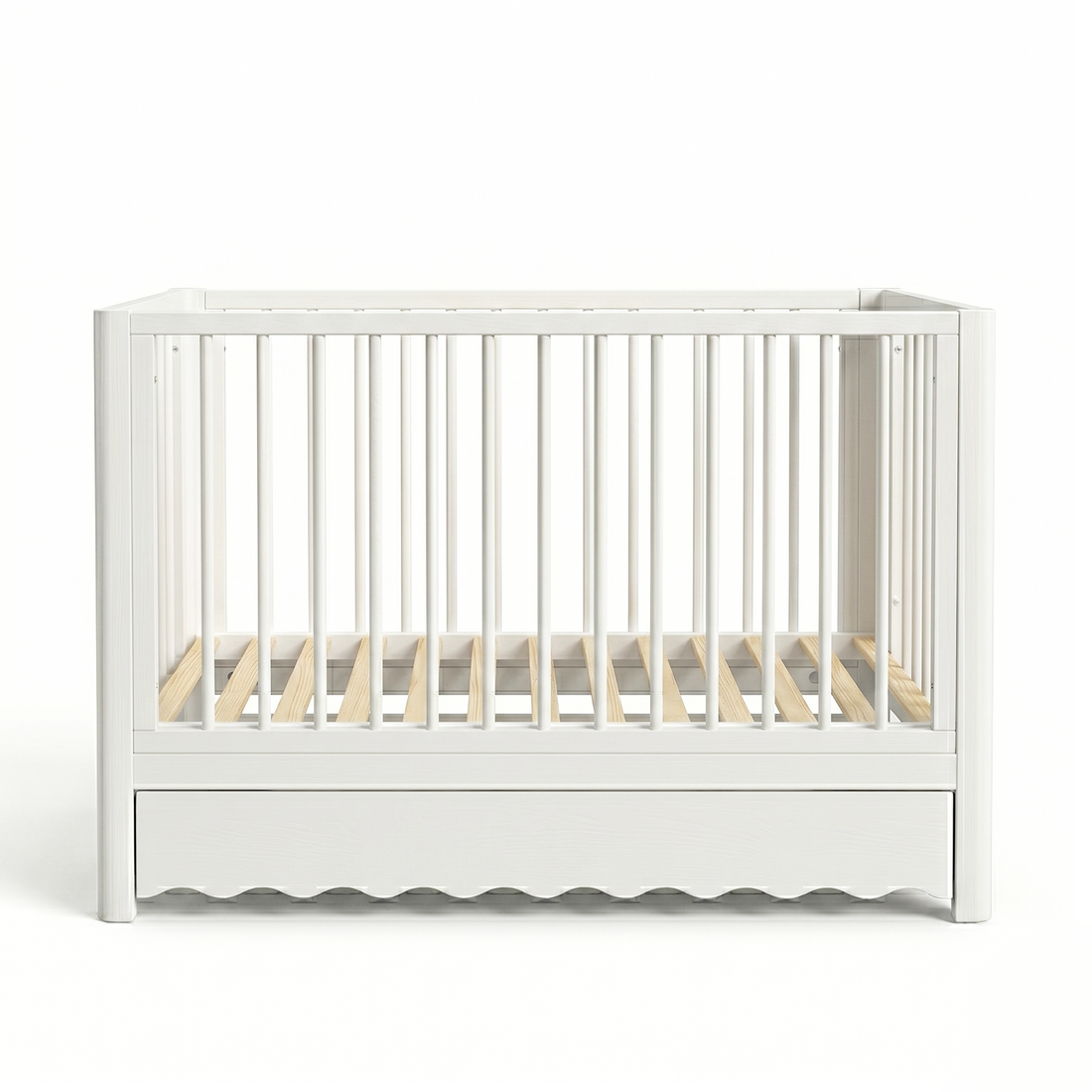White wooden crib with storage drawer on white background