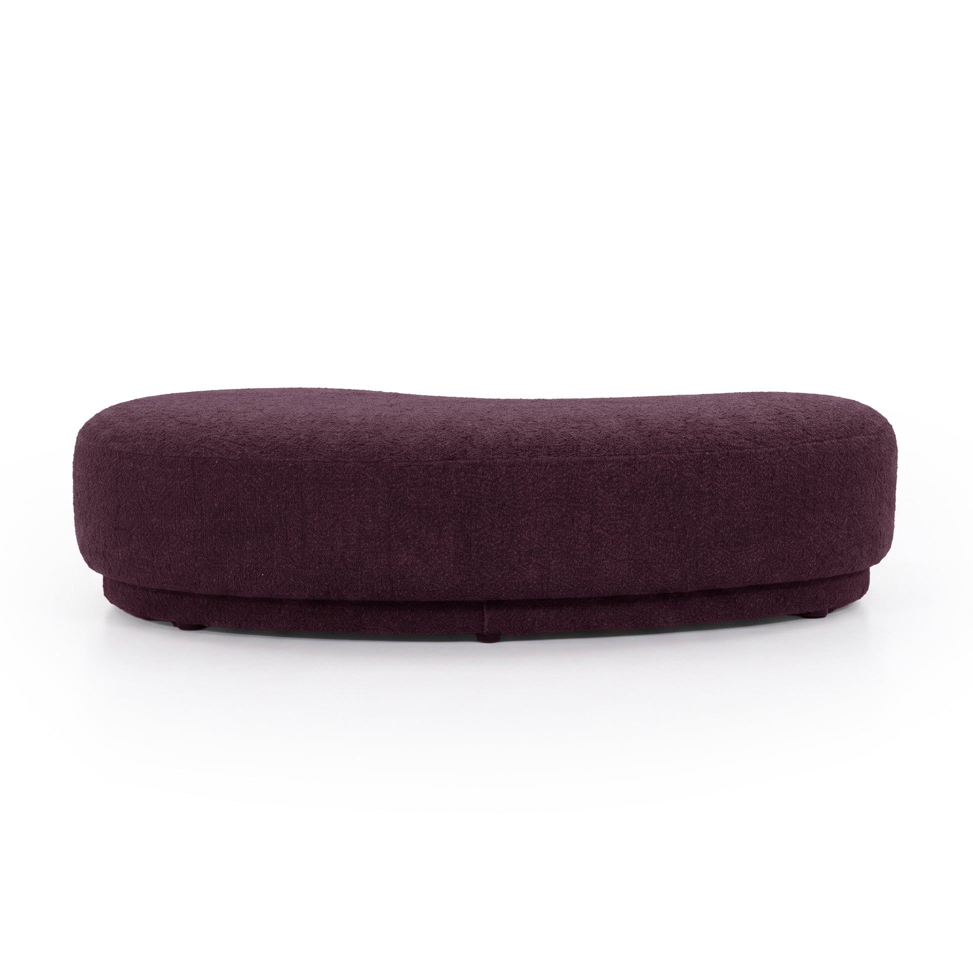 Rounded rectangular plum upholstered  bench seat on a white background