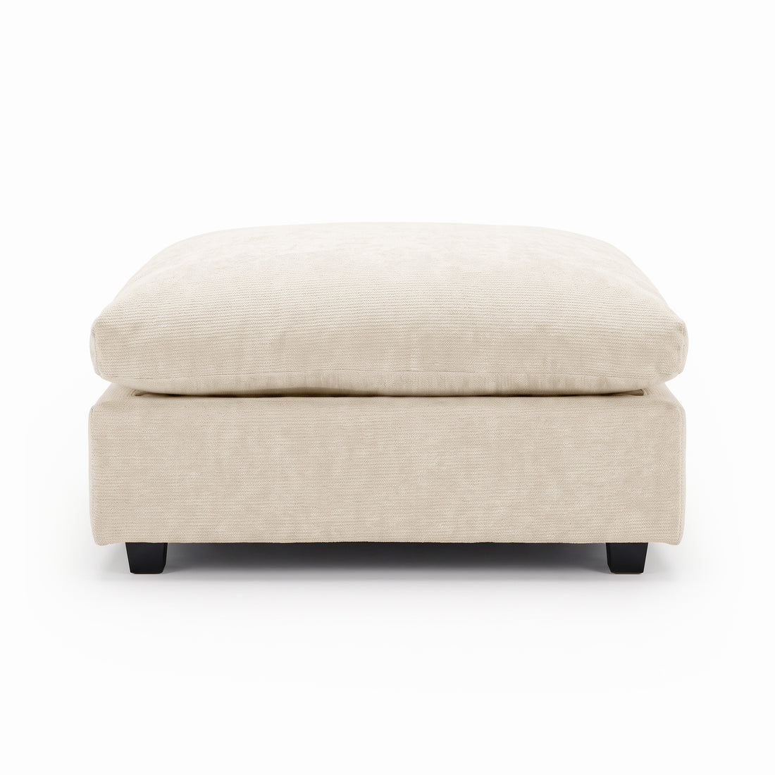 Rectangular beige upholstered ottoman on a white background