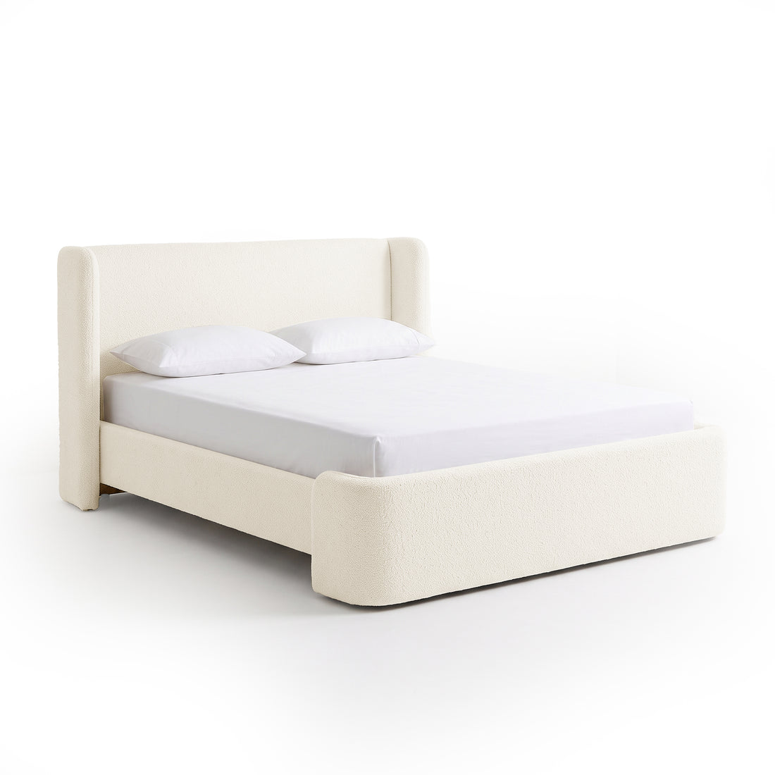 Full upholstered bed on a plain white background