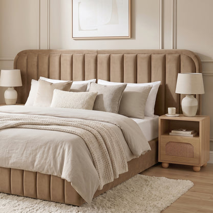 Upholstered bed with channel-tufted headboard in styled bedroom setting