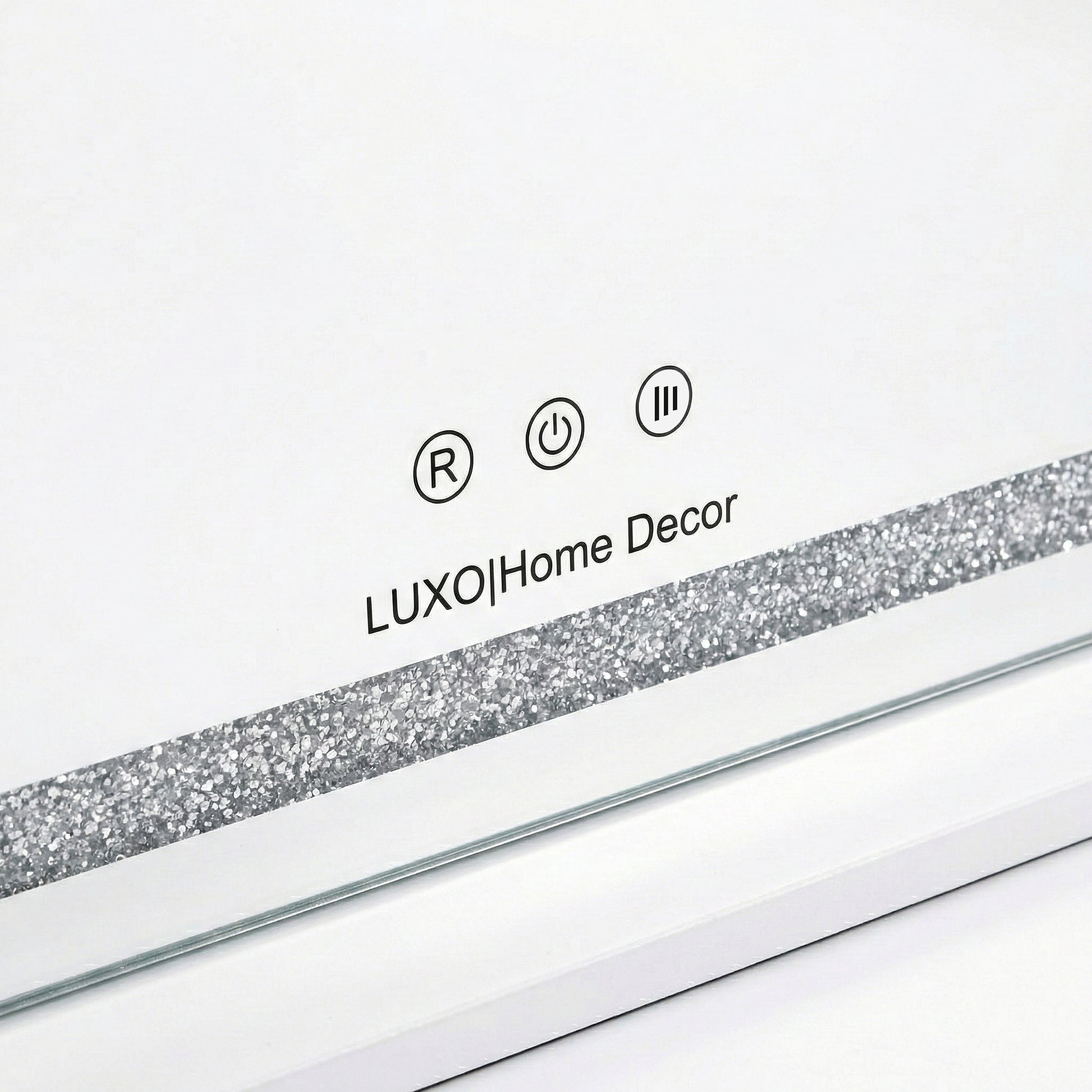 Close-up showing glitter strip and branding icons of the mirror on white background