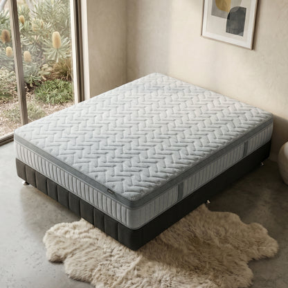 Mattress on a bed base in a modern, softly lit bedroom