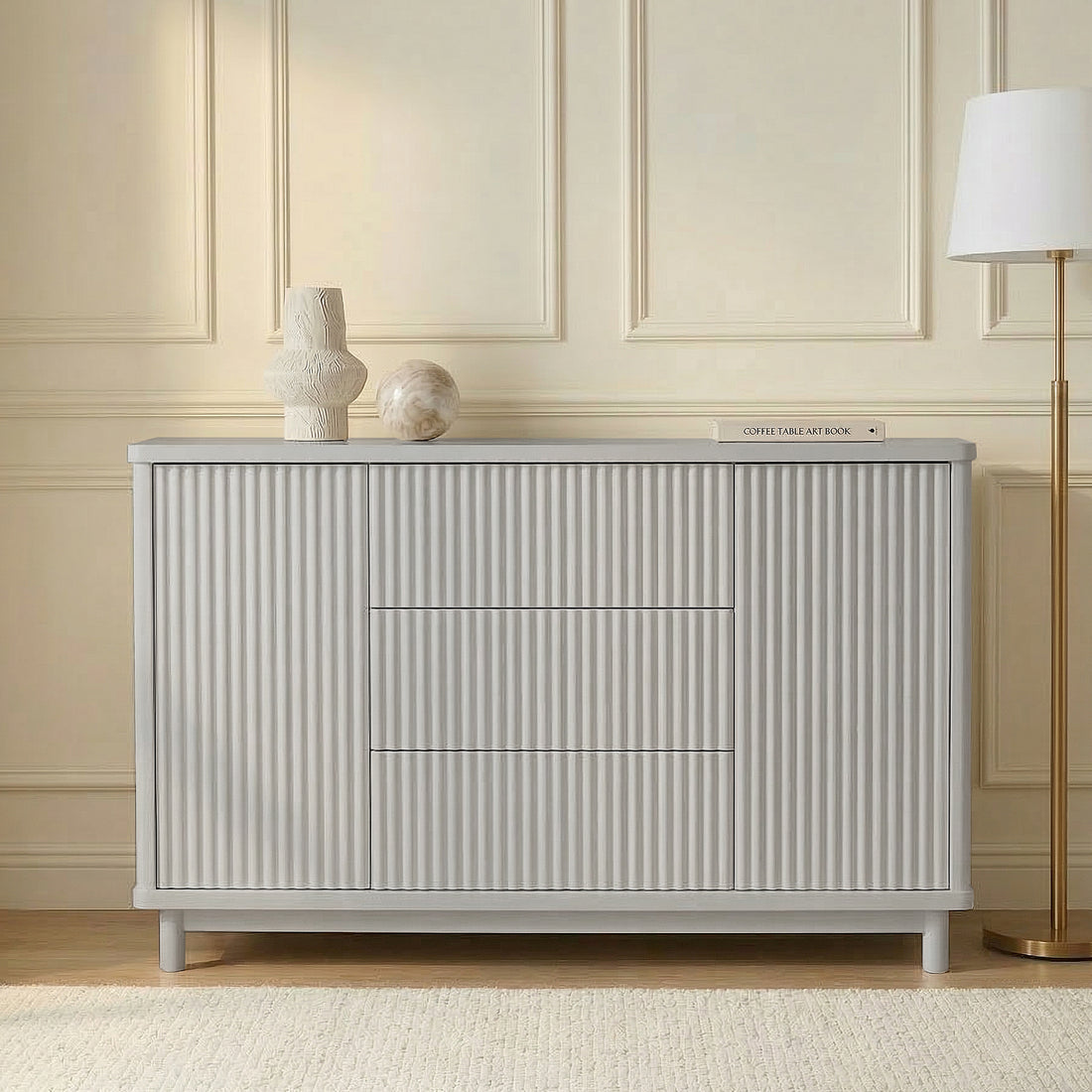 Modern sideboard with decorative objects in a minimalist room