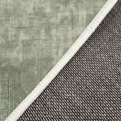 Close-up of rug edge and backing texture