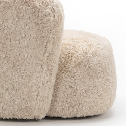 Close-up of beige faux fur accent chair upholstered product texture on a white background